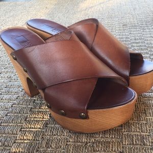 Brown leather wooden platform slides